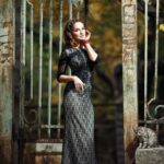 woman-with-cats-rusty-iron-fence_1208-183.jpg
