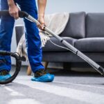 person-cleaning-carpet-with-vacuum-cleaner-picture-id1191080465-1024x683.jpg