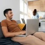 side-view-man-holding-laptop_23.webp