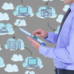man-with-tablet-clouds-background-icons_1134-553.jpg