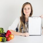 female-dietician-holding-blank-clipboard_23-2147882170.jpg