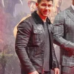 Nick-Jonas-Jumanji-3-Alex-Vreeke-Fur-Collar-Brown-Leather-Jacket.webp
