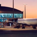 plane-at-an-airport-terminal-airport-planning-hero-2.jpg