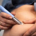 a-person-is-shown-self-injecting-medication-into-their-abdomen-using-an-auto-injector-pen-the-image-071912327-16x9_0.jpg