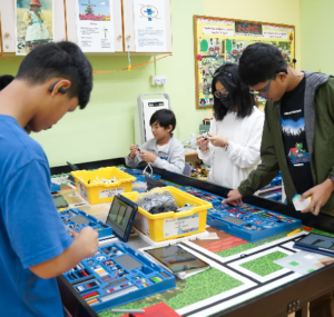 Preparing the Next Generation: How Robots with Coding and Robotics Competitions