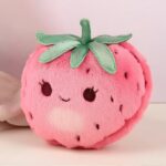 freepicdownloader.com-there-is-pink-stuffed-animal-with-green-bow-top-normal.jpg