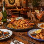 Lucid_Origin_A_vibrant_Spanish_seafood_feast_in_a_cozy_Swansea_0.jpg