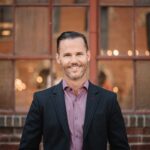 imgi_31_Peter-Sheahan-Headshot-scaled-1-2048x1367.jpeg