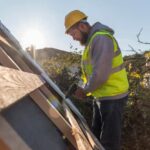 man-working-roof-with-drill_23-2148748770-1.jpg