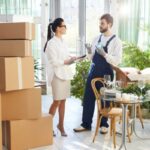 mover-showing-glass-to-customer1.jpg