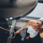 woman-looking-shower-while-standing-bathroom_1048944-4940450.jpg