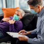 male-psychiatrist-going-through-data-his-patient-while-having-appointment-coronavirus-pandemic-1-1-1.jpg