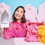 man-concentrated-going-ironing-home-holds-steam-electric-iron-thinks-about-plans-after-finishing-housework-1.jpg