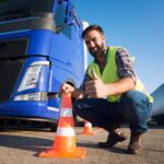 man-learning-how-drive-truck-driving-schools-1-1-1.jpg