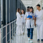 team-young-specialist-doctors-standing-corridor-hospital.jpg