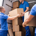 bigstock-Truck-Movers-Loading-Van-Carry-380729065.jpg