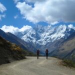imgi_11_Hikers-on-the-Trail-with-Majestic-Snow-Capped-Mountain-View-2.jpeg