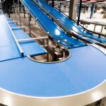 Why-Curve-Belt-Conveyors-Are-the-Perfect-Solution-for-Navigating-Tight-Corners-in-Warehouse-Layouts.jpg